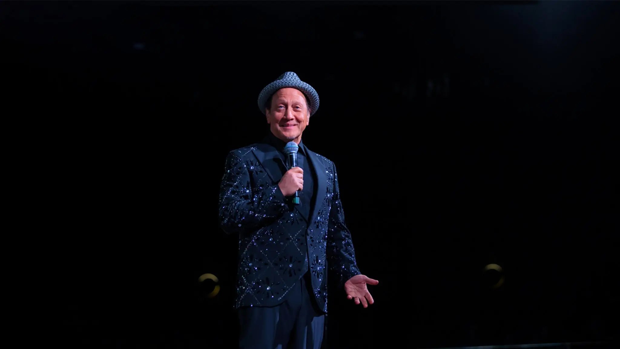 Rob Schneider performing on tour